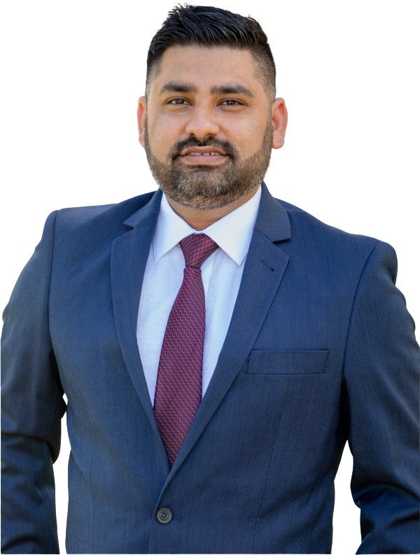 Professional headshot of Indy Singh, Director of Silver Key Realty, real estate expert with over 10 years of experience.