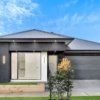 Front view of a modern single-storey house with double garage at 44 Gould Crescent, Mickleham, Victoria