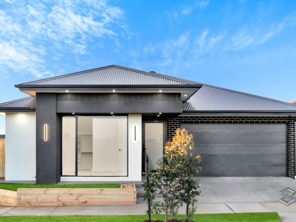 Front view of a modern single-storey house with double garage at 44 Gould Crescent, Mickleham, Victoria